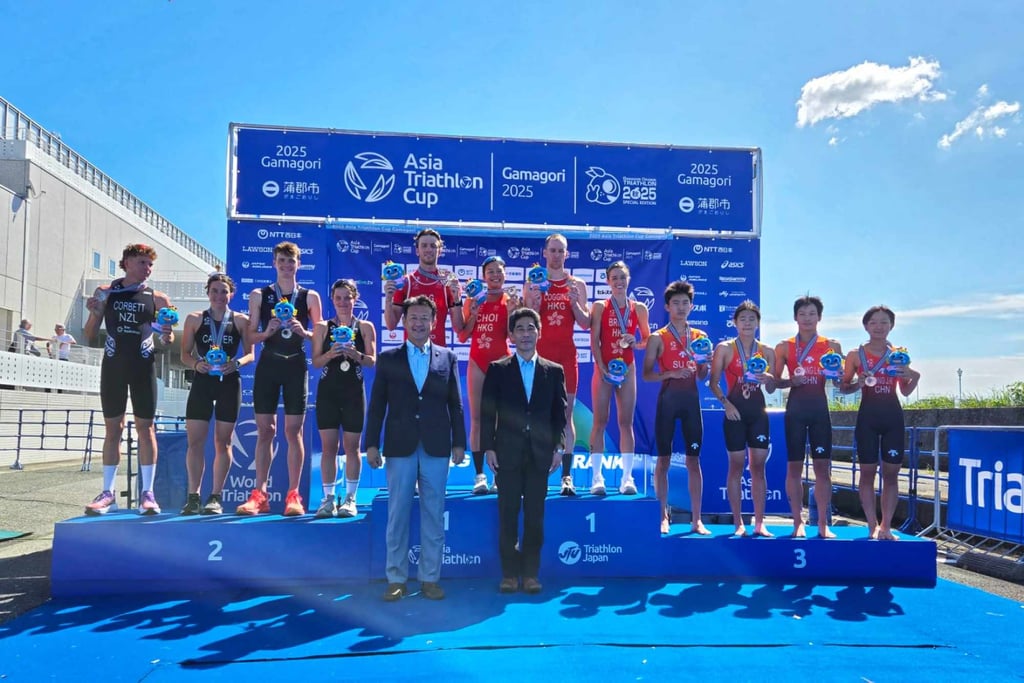 Hong Kong’s victorious quartet enjoy their moment on top of the podium. Photo: TAHKC