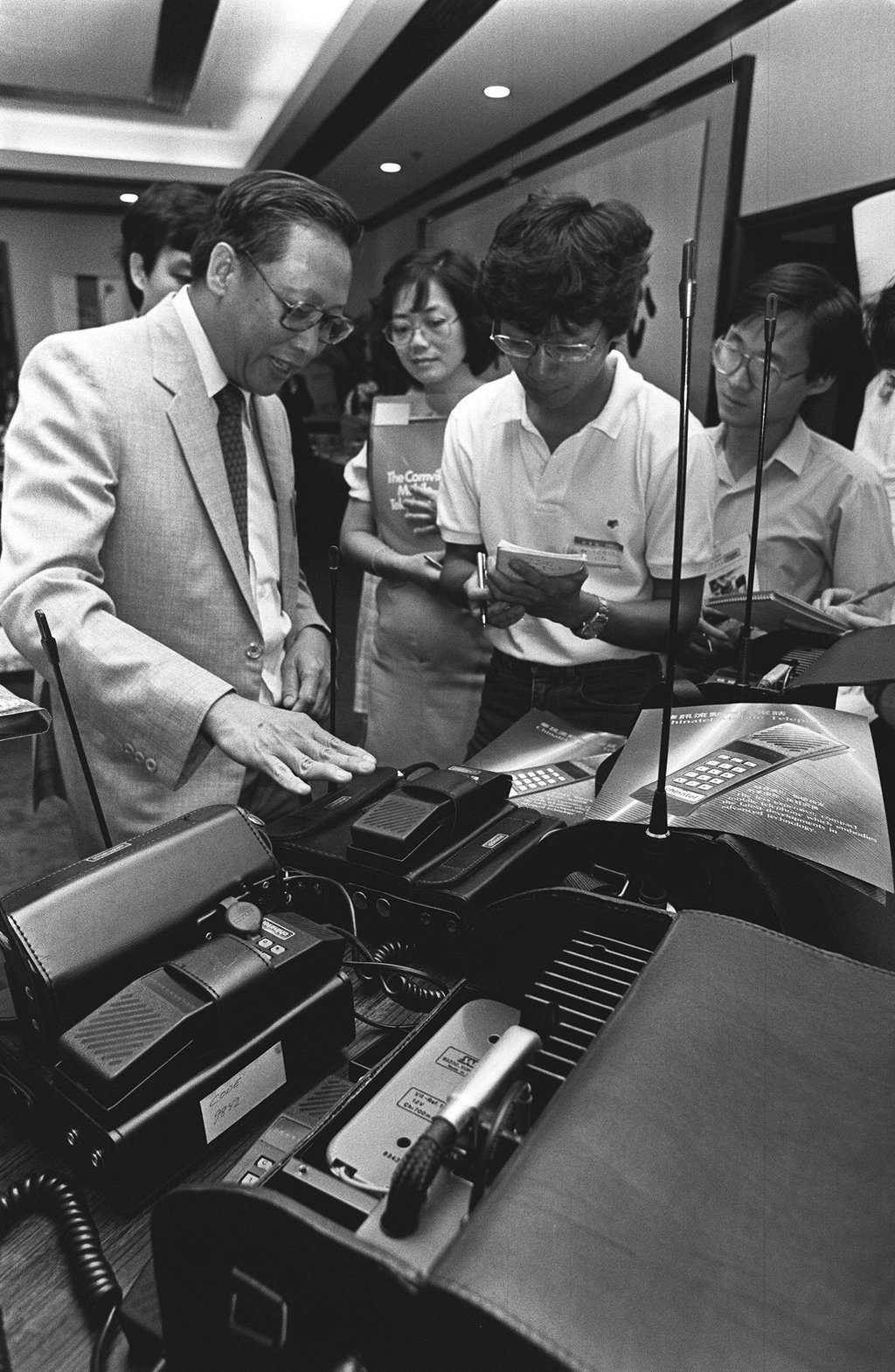 Yam Yau-ban, the chief engineer of China Telecom, gives a demonstration of a mobile phone in 1984. The 4kg telephone set could make local and international calls from anywhere in Hong Kong, except the outlying islands. Photo: SCMP Archives
