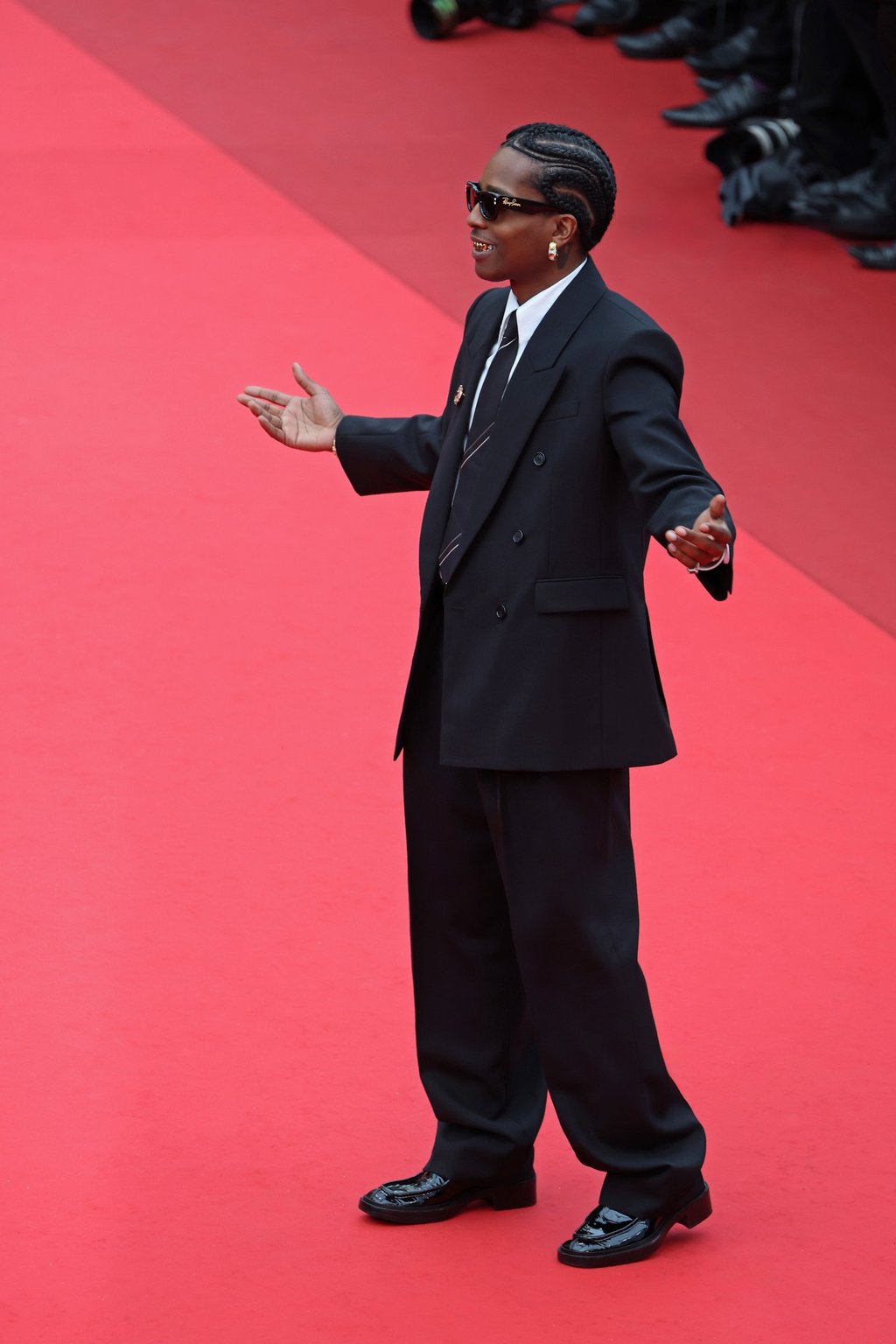 A$AP Rocky in a Saint Laurent double-breasted suit at Cannes in May. Photo: Getty Images A$AP Rocky in a Saint Laurent double-breasted suit at Cannes in May. Photo: Getty Images