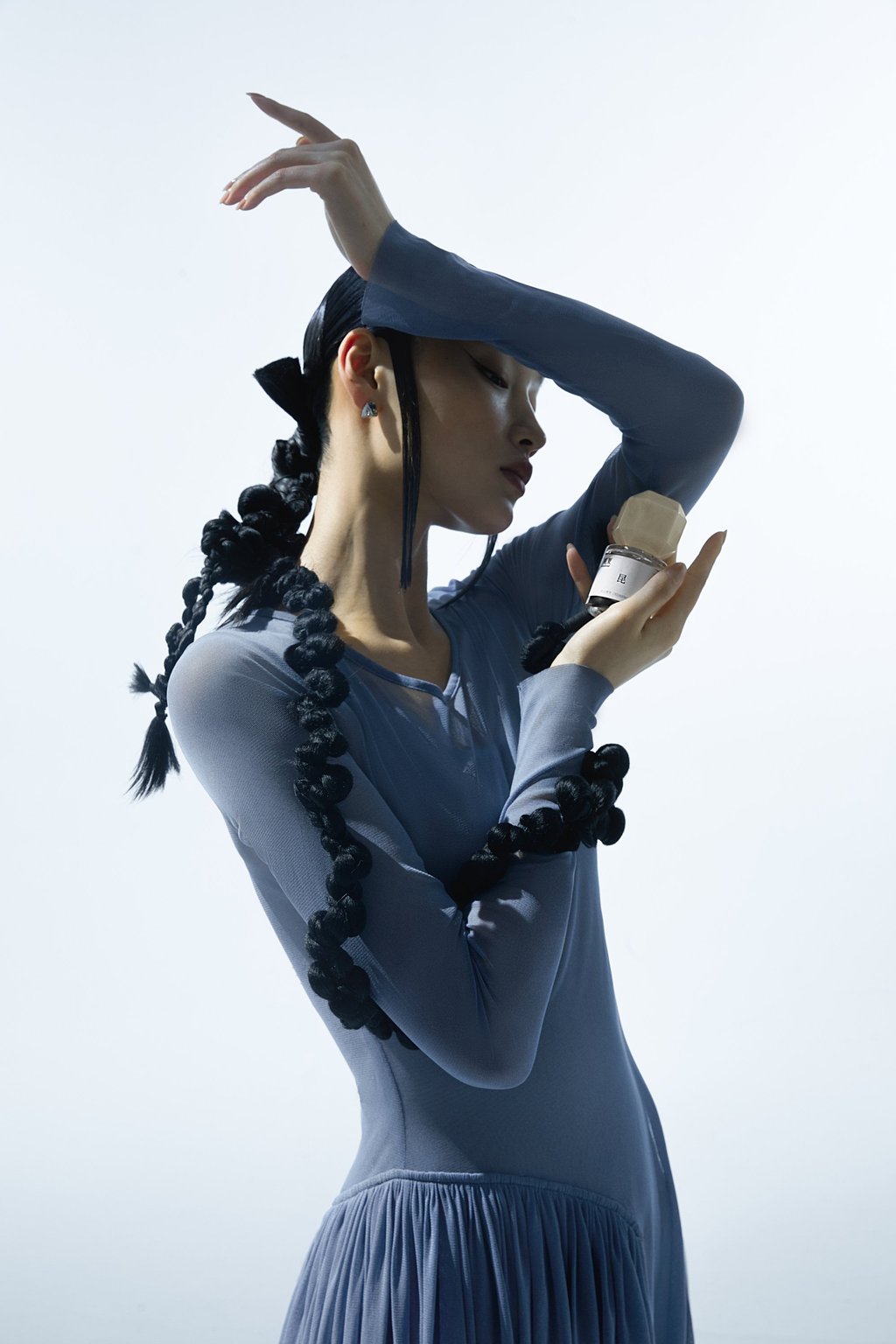 A model holds the To Summer Cedarwood fragrance. Photo: Handout A model holds the To Summer Cedarwood fragrance. Photo: Handout