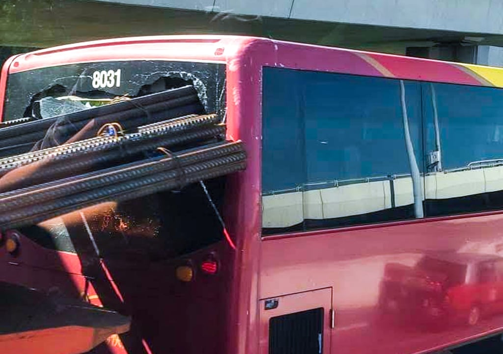 Double-decker bus E23 was heading to the airport when it was hit by a truck. Photo: Handout