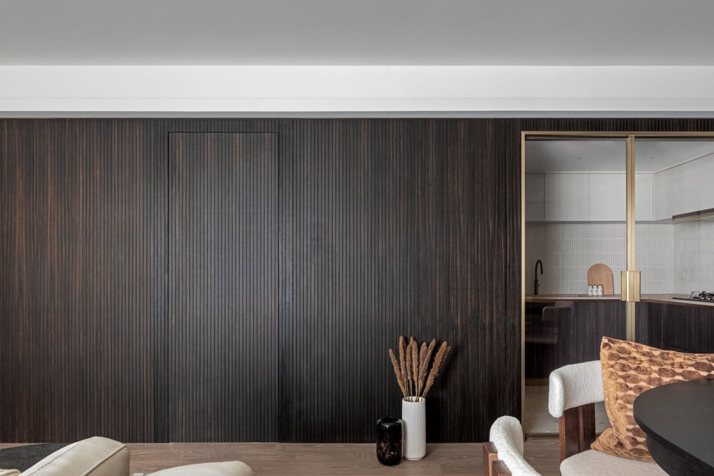 Wall panelling with concealed storage-room door, by hoo. Photo: hoo