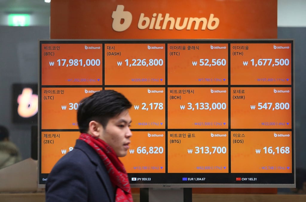A man goes through a screen showing Bitcoin prices in a virtual exchange desk in Seoul. South Korea is one of the nations which are directed the growth of transactions in Asia-Pacific. Photo: AP A man goes through a screen showing Bitcoin prices in a virtual exchange desk in Seoul. South Korea is one of the nations which are directed the growth of transactions in Asia-Pacific. Photo: AP
