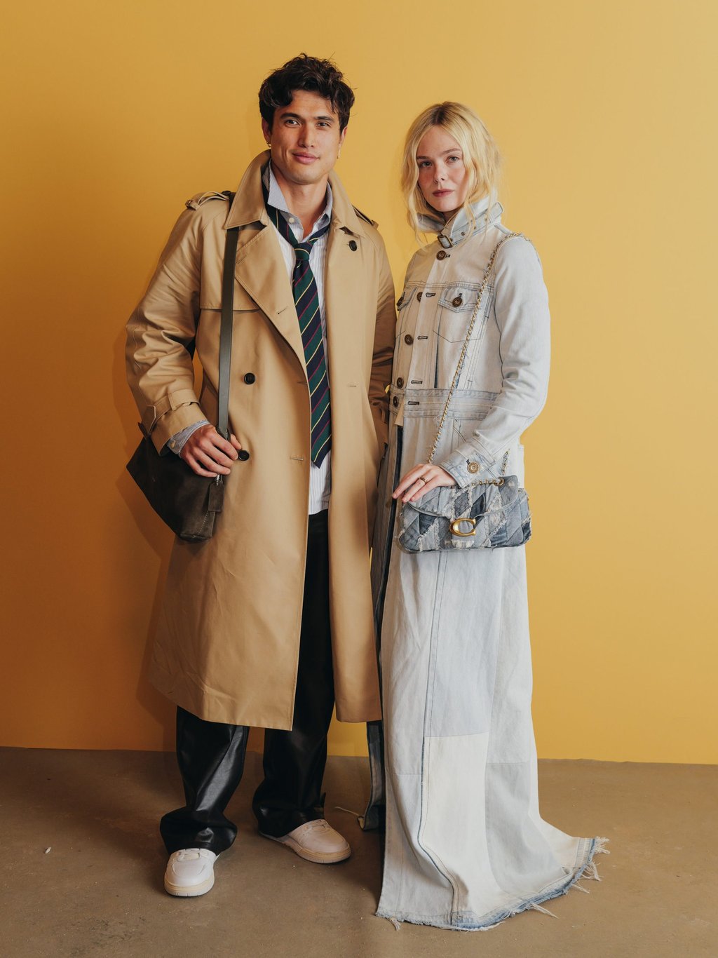 Charles Melton and Elle Fanning in Coach looks for spring 2026. Photo: Handout Charles Melton and Elle Fanning in Coach looks for spring 2026. Photo: Handout