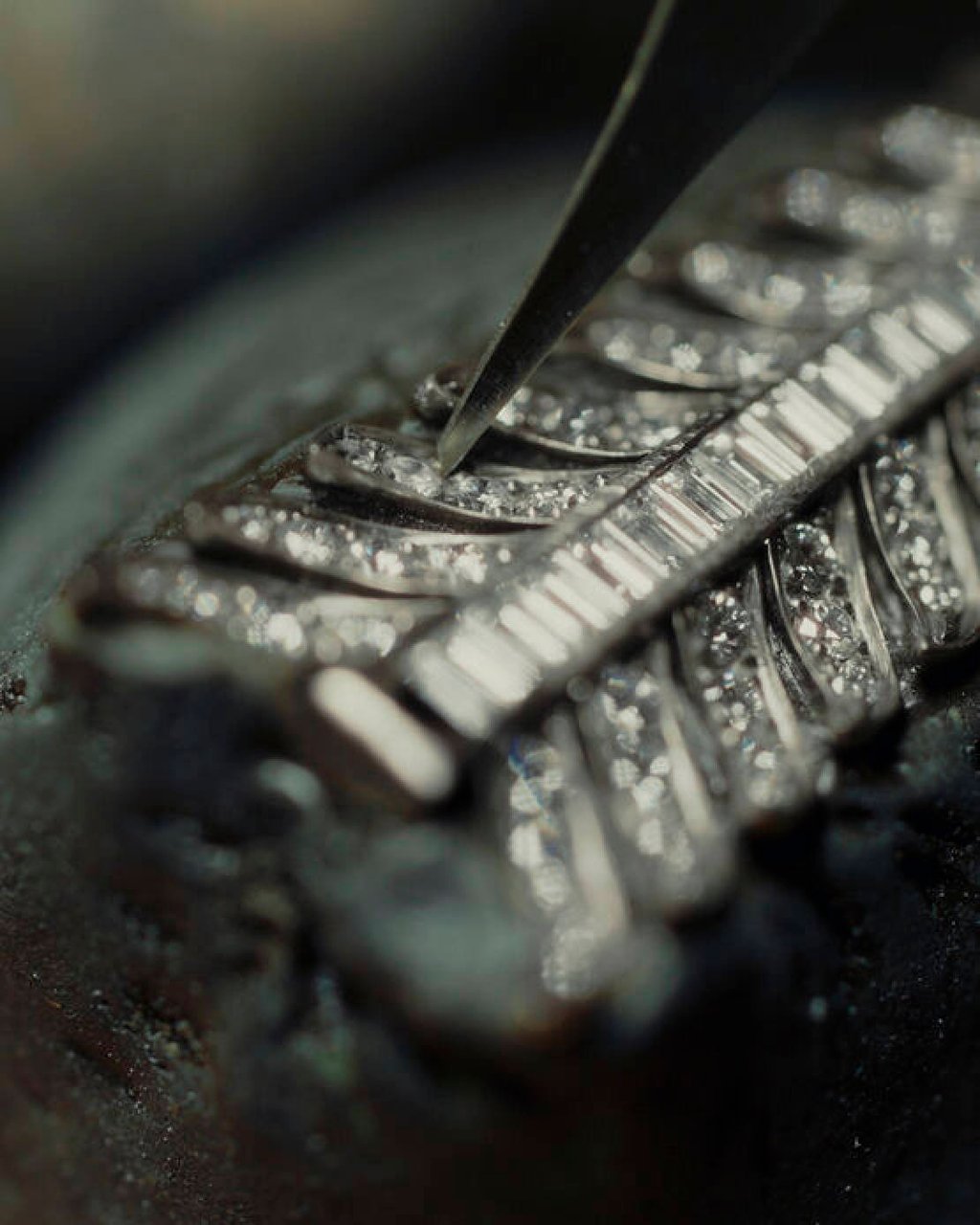 Setting diamonds in the arrow’s fletching. Photo: Handout