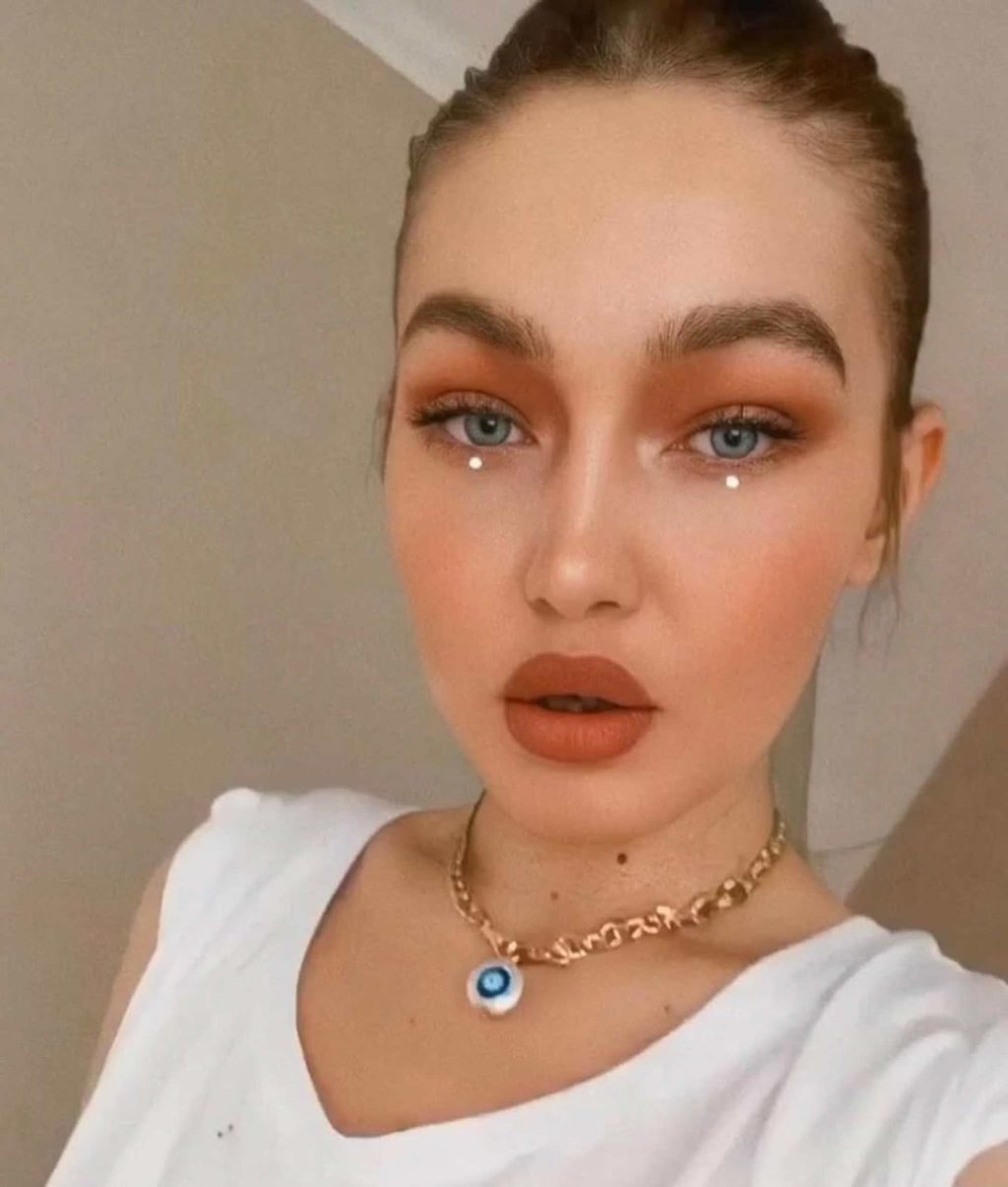 Gigi Hadid wears the Martha Calvo Evil Eye Protection Necklace. Photo: @MarthaCalvo/Instagram