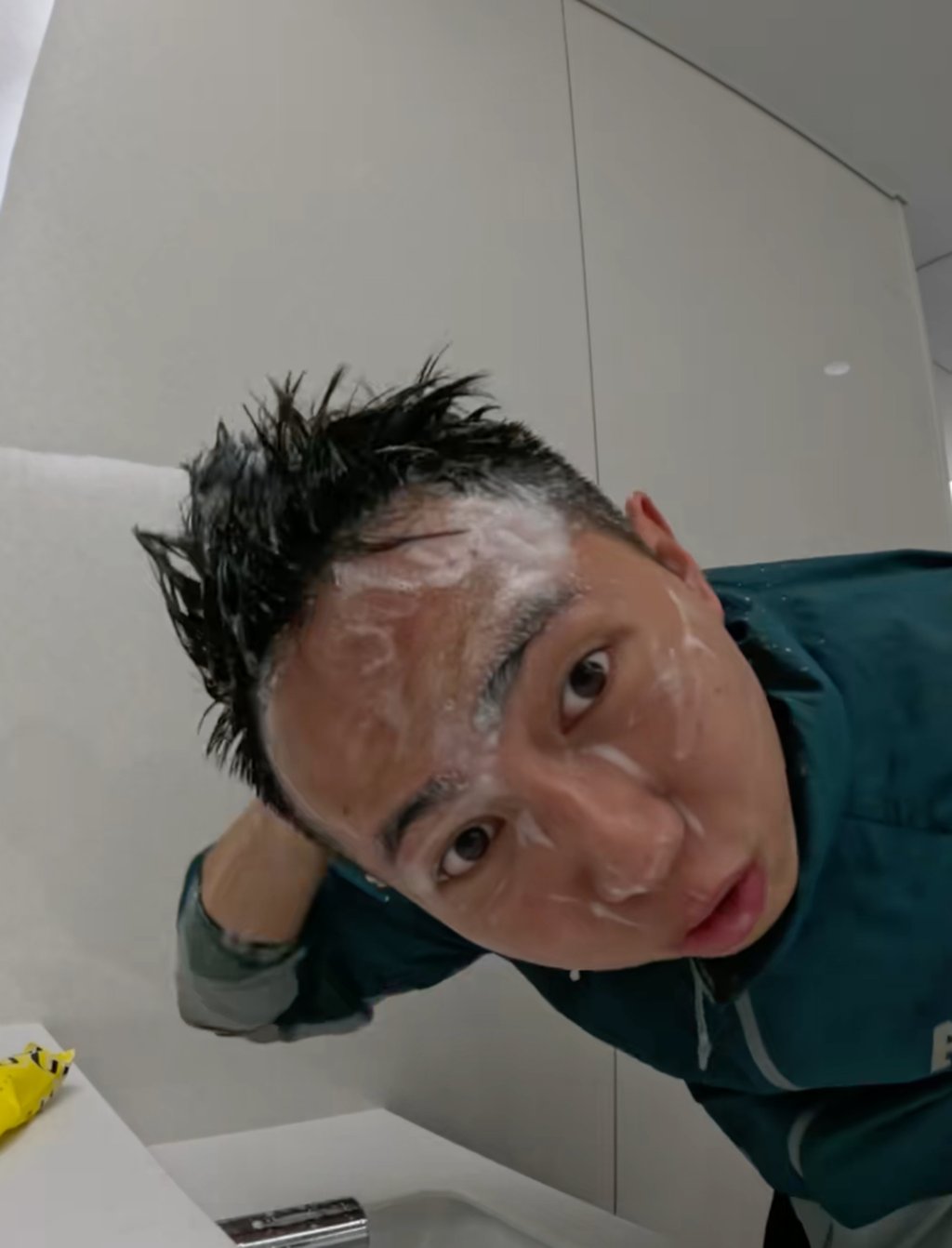 The travel influencer caused anger by washing his hair in a sink in a public toilet. Photo: Handout