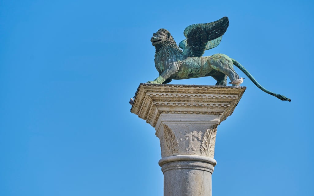 The famous bronze winged lion overlooks St Mark’s Square in Venice, Italy. Photo: Shutterstock