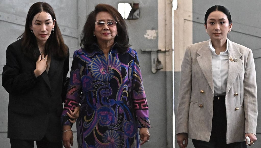 Thailand’s former prime minister Paetongtarn Shinawatra (right) walks out with her mother, Potjaman Na Pombejra (centre), and sister Pintongta after visiting her father, Thaksin, at Klong Prem Central Prison in Bangkok on September 15. Photo: AFP