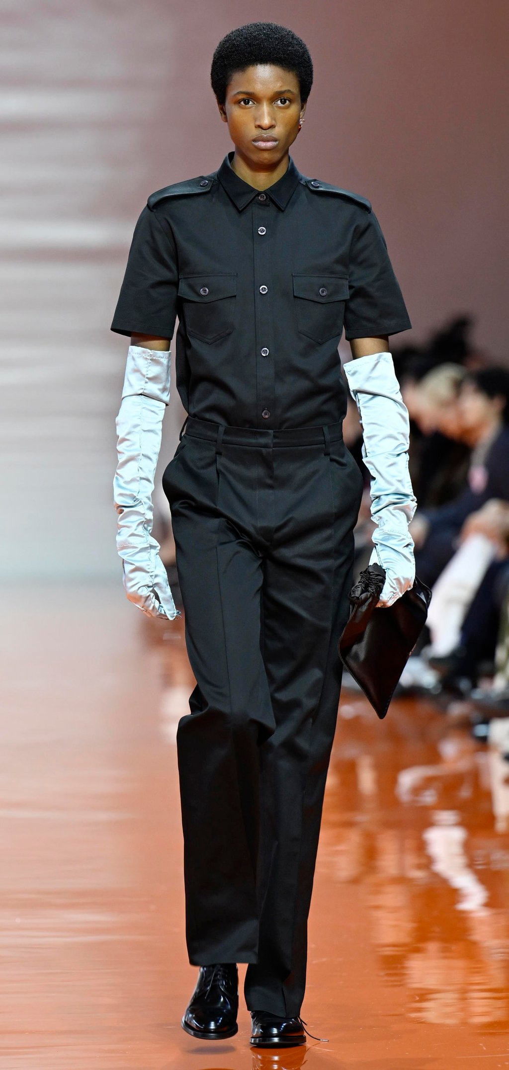 The last look in Prada’s spring/summer 2026 line-up was yet another uniform-like outfit. Photo: EPA The last look in Prada’s spring/summer 2026 line-up was yet another uniform-like outfit. Photo: EPA