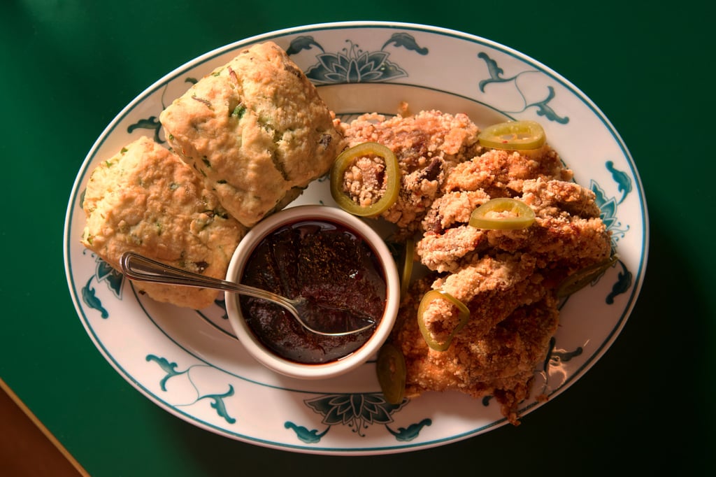 Potluck Club’s salt and pepper chicken with spring onion biscuits, pickled jalapeños and chilli-plum jam. Photo: Potluck Club
