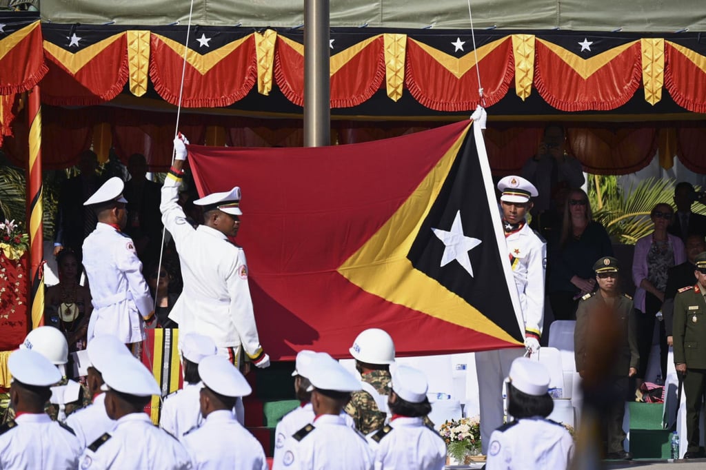 East Timor’s national flag is raised in Dili during a ceremony marking its 20th anniversary of independence in 2022. Photo: Kyodo