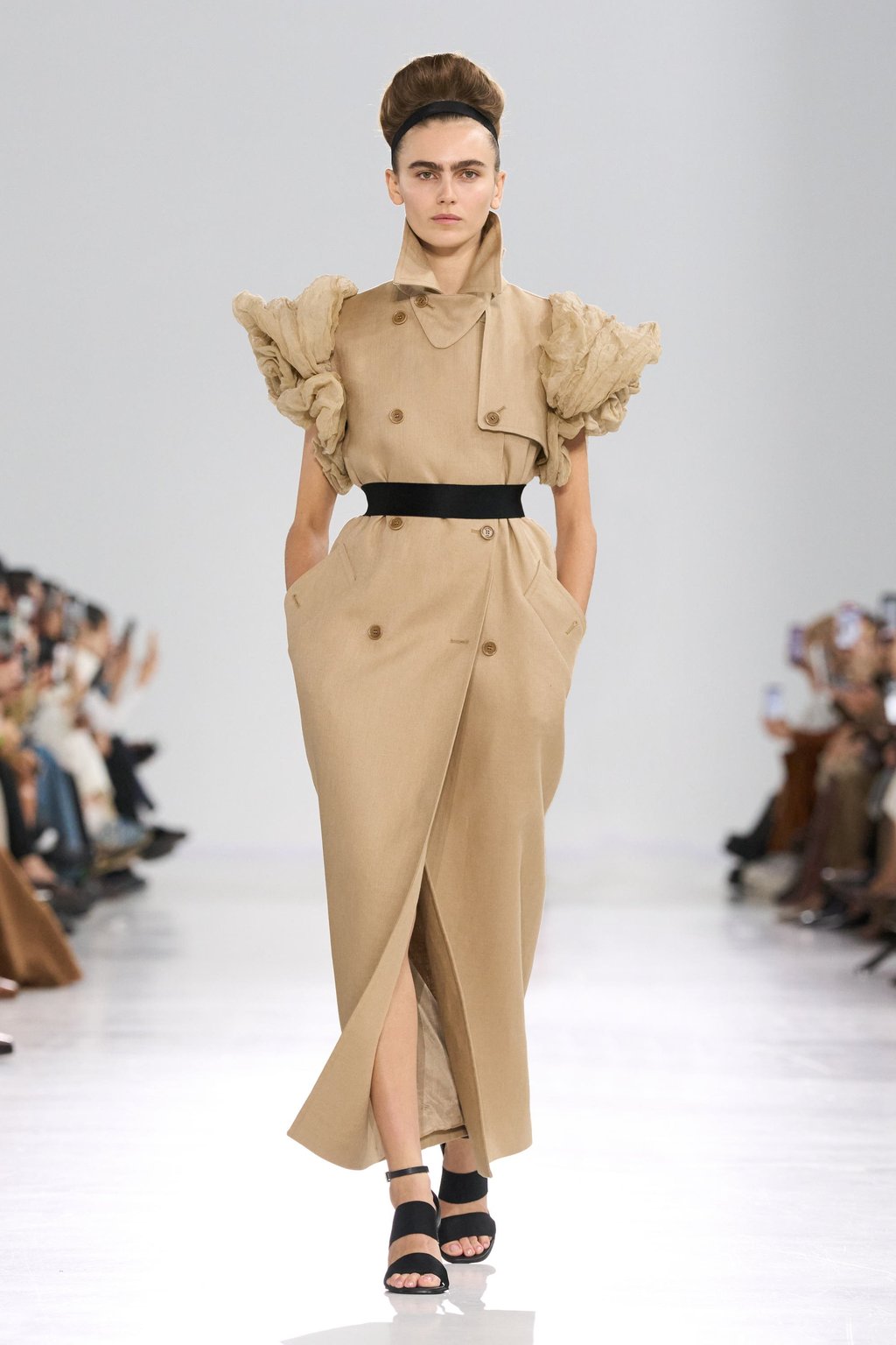 Shoulder embellishments that resemble blooms or bird plumage in the Max Mara collection. Photo: Handout