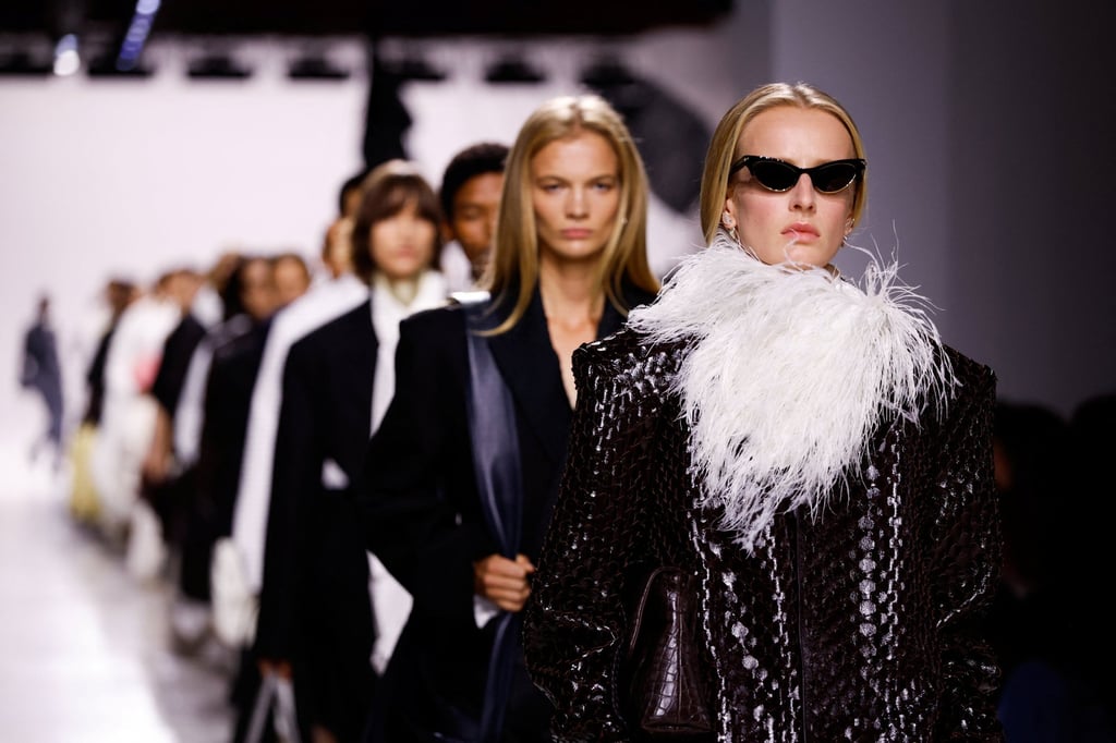 The collection included coats made of Intrecciato and lots of feather embellishments. Photo: Reuters