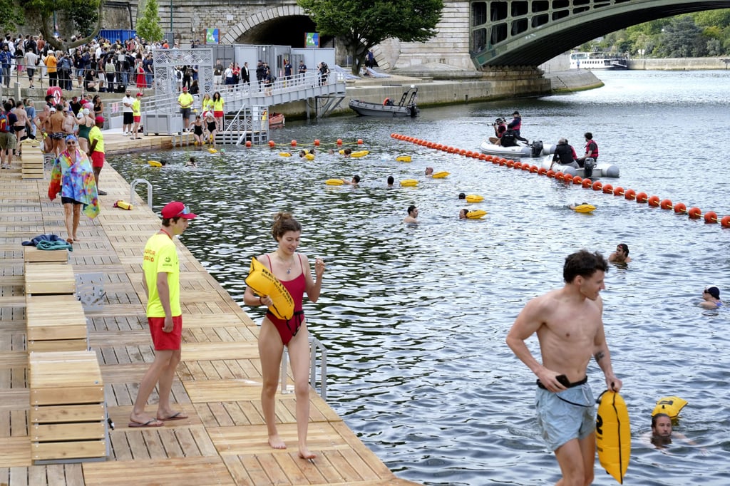 People swim in the River Seine on July 5, 2025, after the 1923 ban on public swimming was lifted following a clean-up project by the state and municipal governments ahead of the Paris Olympics and Paralympics in 2024. Photo: Kyodo People swim in the River Seine on July 5, 2025, after the 1923 ban on public swimming was lifted following a clean-up project by the state and municipal governments ahead of the Paris Olympics and Paralympics in 2024. Photo: Kyodo