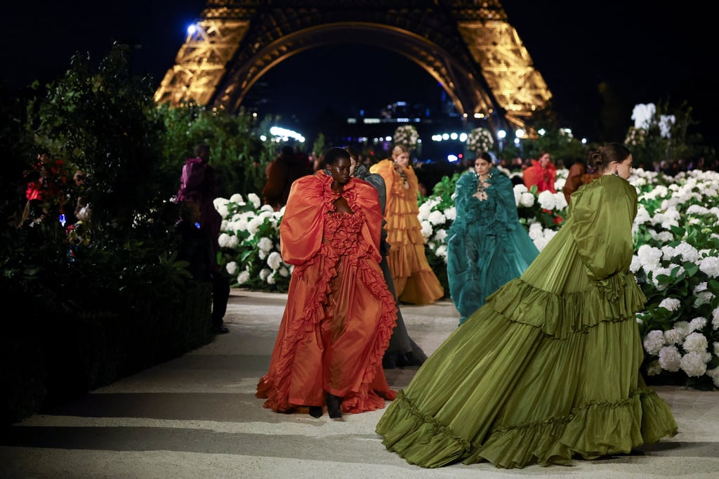 The finale of the Saint Laurent show with the Eiffel Tower as a backdrop. Photo: Reuters