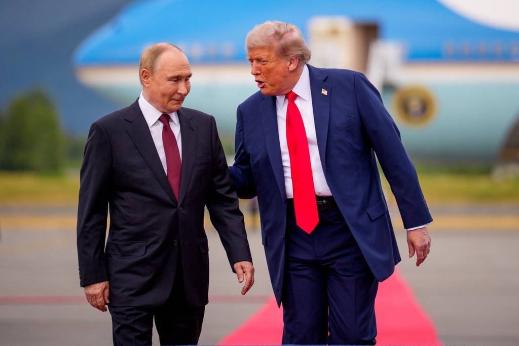 US President Donald Trump (right) greets Russian President Vladimir Putin as he arrives at Joint Base Elmendorf-Richardson in Anchorage, Alaska, on August 15. Photo: Getty Images US President Donald Trump (right) greets Russian President Vladimir Putin as he arrives at Joint Base Elmendorf-Richardson in Anchorage, Alaska, on August 15. Photo: Getty Images
