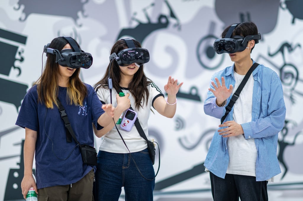 Young visitors take part in a VR experience in Wuhan, in central China’s Hubei Province, on April 29, 2025. Photo: Xinhua