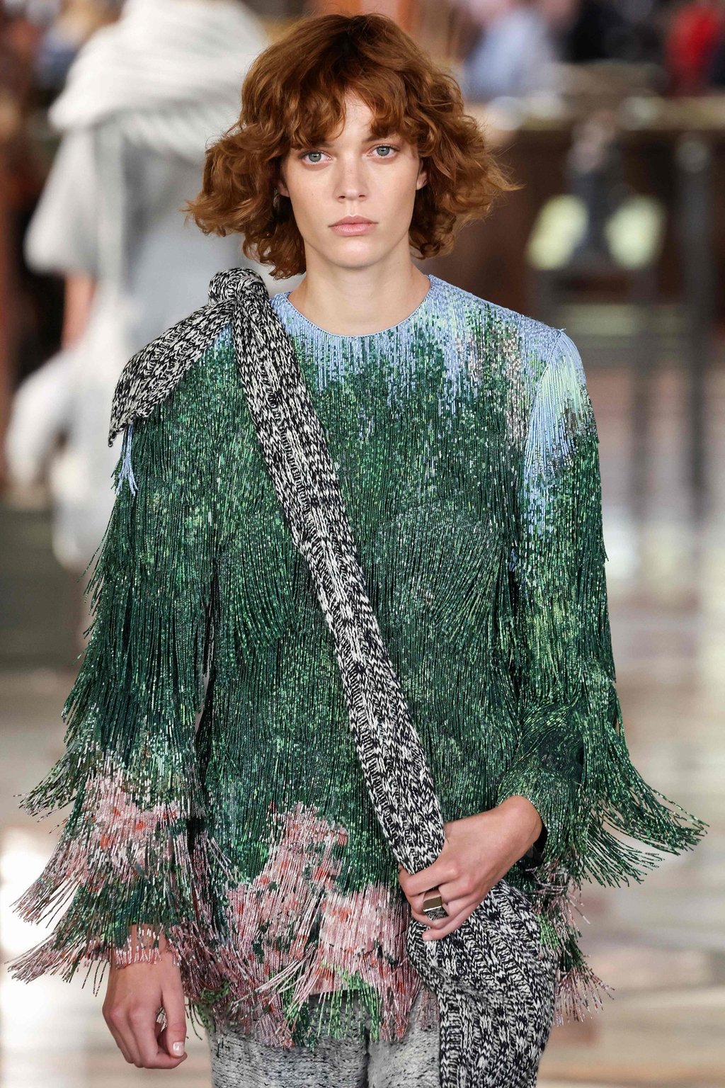 This fringed look paired with a knit bag was a show-stopper. Photo: AFP
