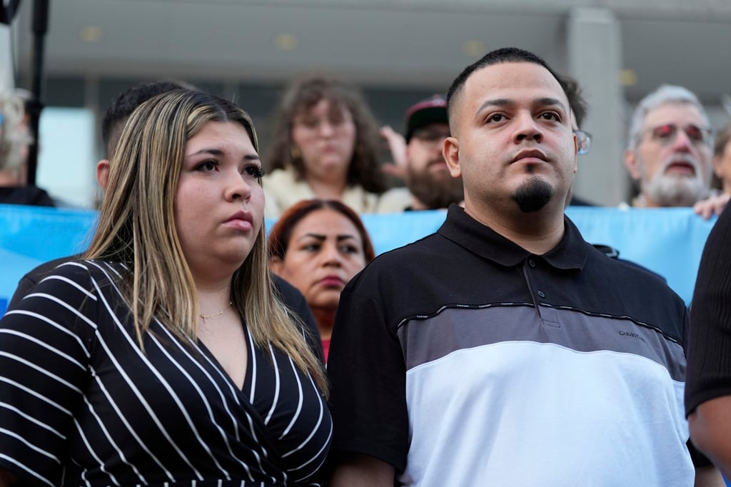 Jennifer Vasquez Sura (left) and her husband Kilmar Abrego Garcia attend a protest rally in Baltimore in August. Photo: AP