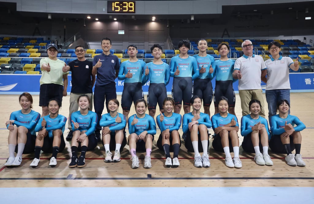 The Hong Kong cycling squad pose for a photo. Photo: Jonathan Wong