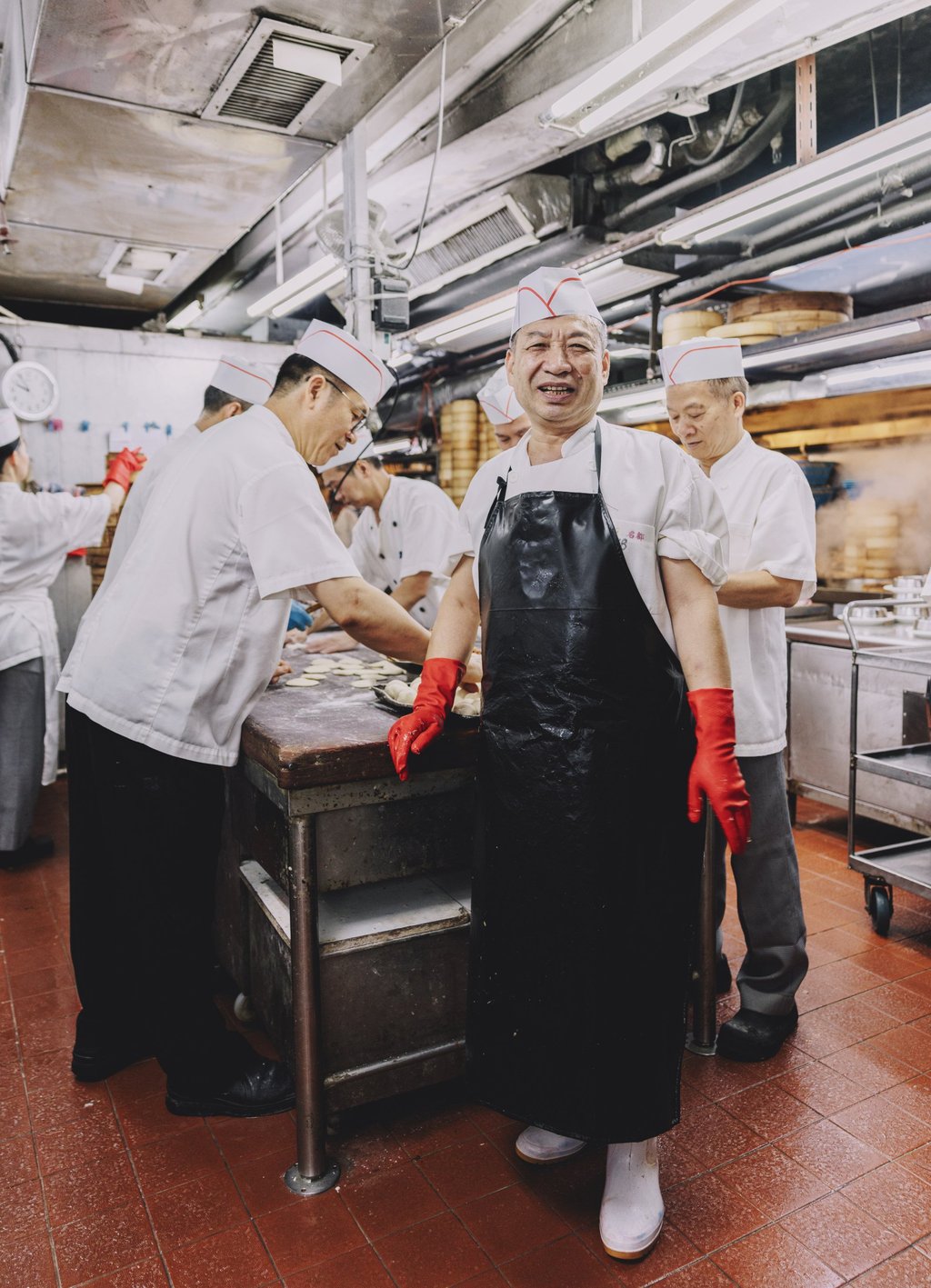 Chan Cheuk-yiu (centre) has worked at the Metropol for 34 years. Photo: Jocelyn Tam