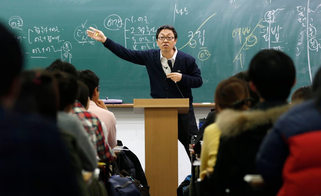 A teacher gives a lecture at a cram school in Seoul, South Korea. Photo: Reuters