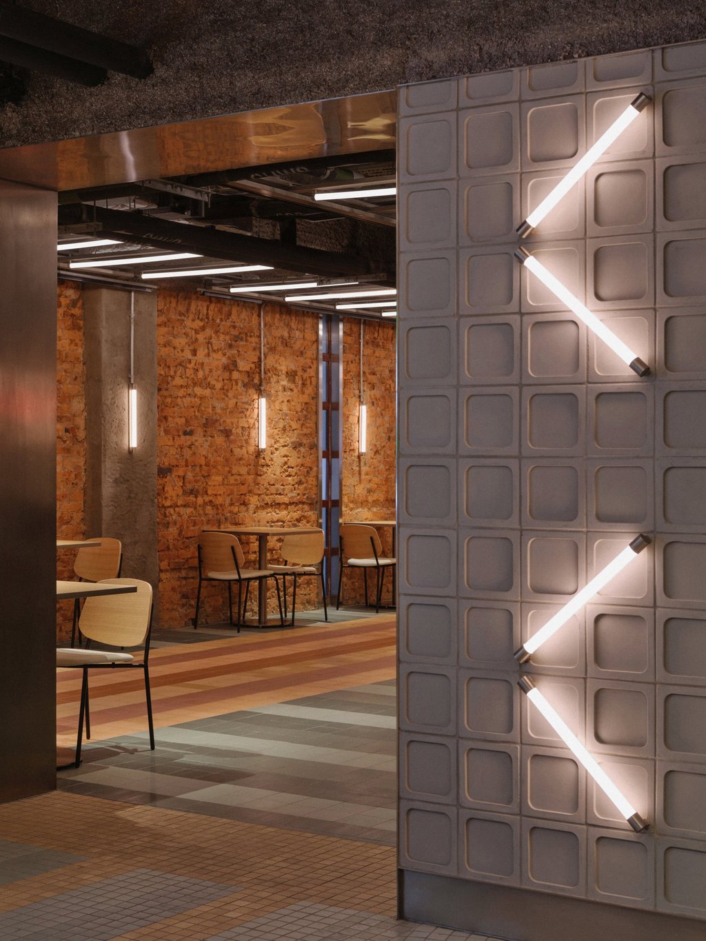 New materials juxtaposed with original exposed brickwork. Photo: Jonathan Leijonhufvud
