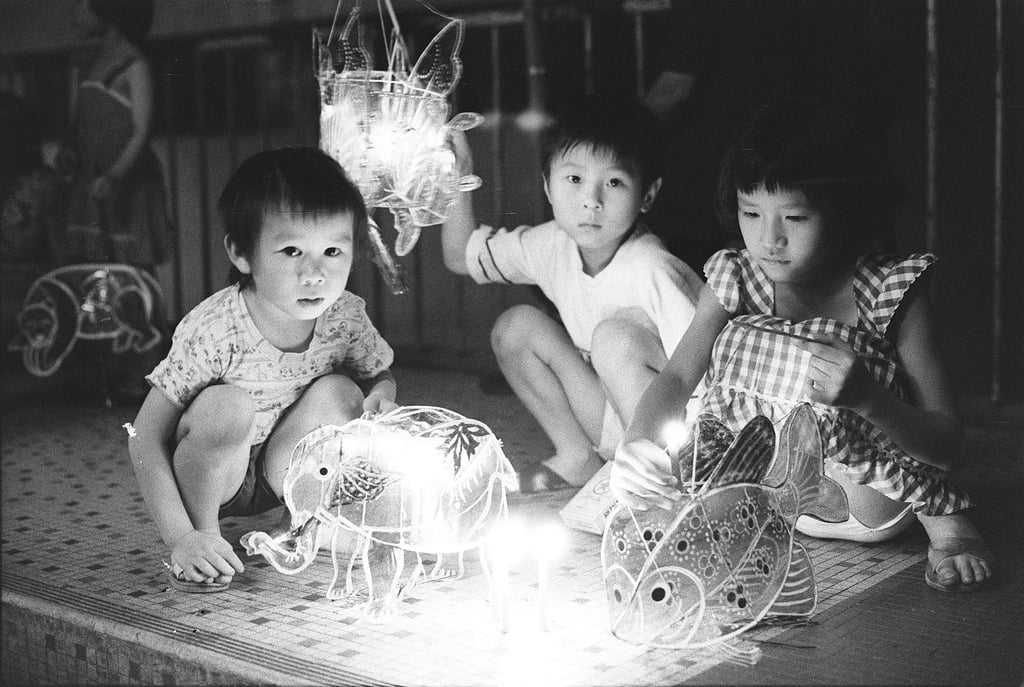 Children playing with lanterns during Mid-Autumn Festival in 1976. Photo: SCMP Archives Children playing with lanterns during Mid-Autumn Festival in 1976. Photo: SCMP Archives
