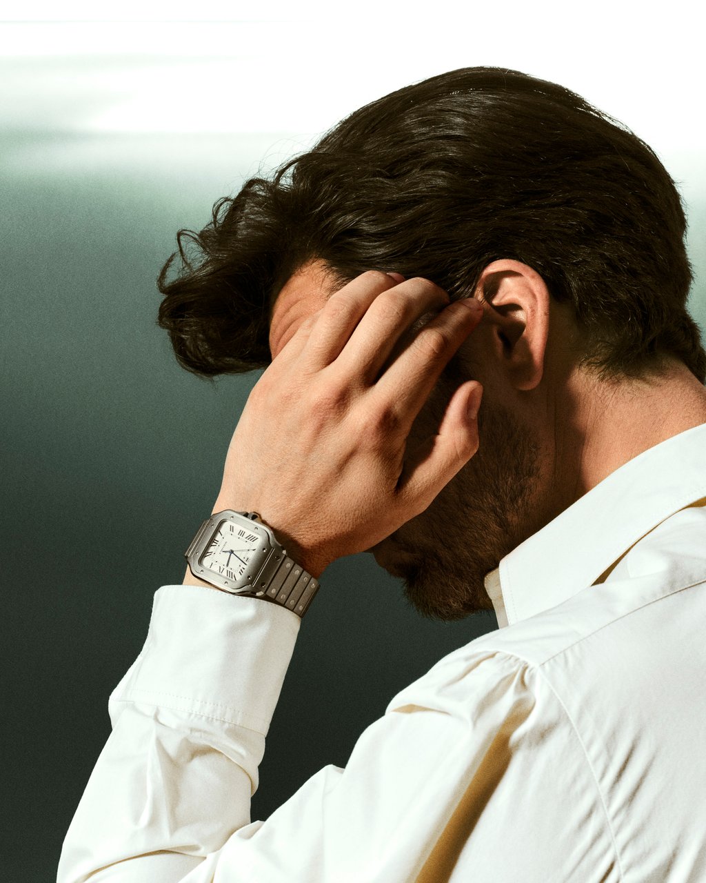 Sebastian Stan wearing the Santos de Cartier in titanium. Photo: Handout