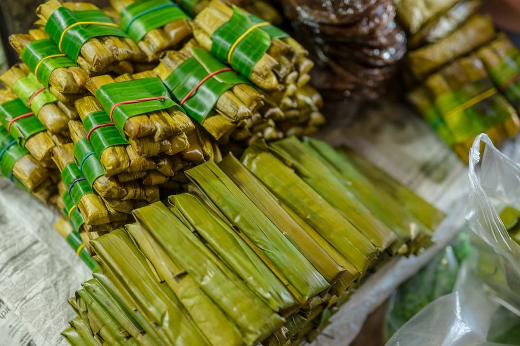 Budbud, sweetened millet wrapped in banana leaves. Photo: Shutterstock
