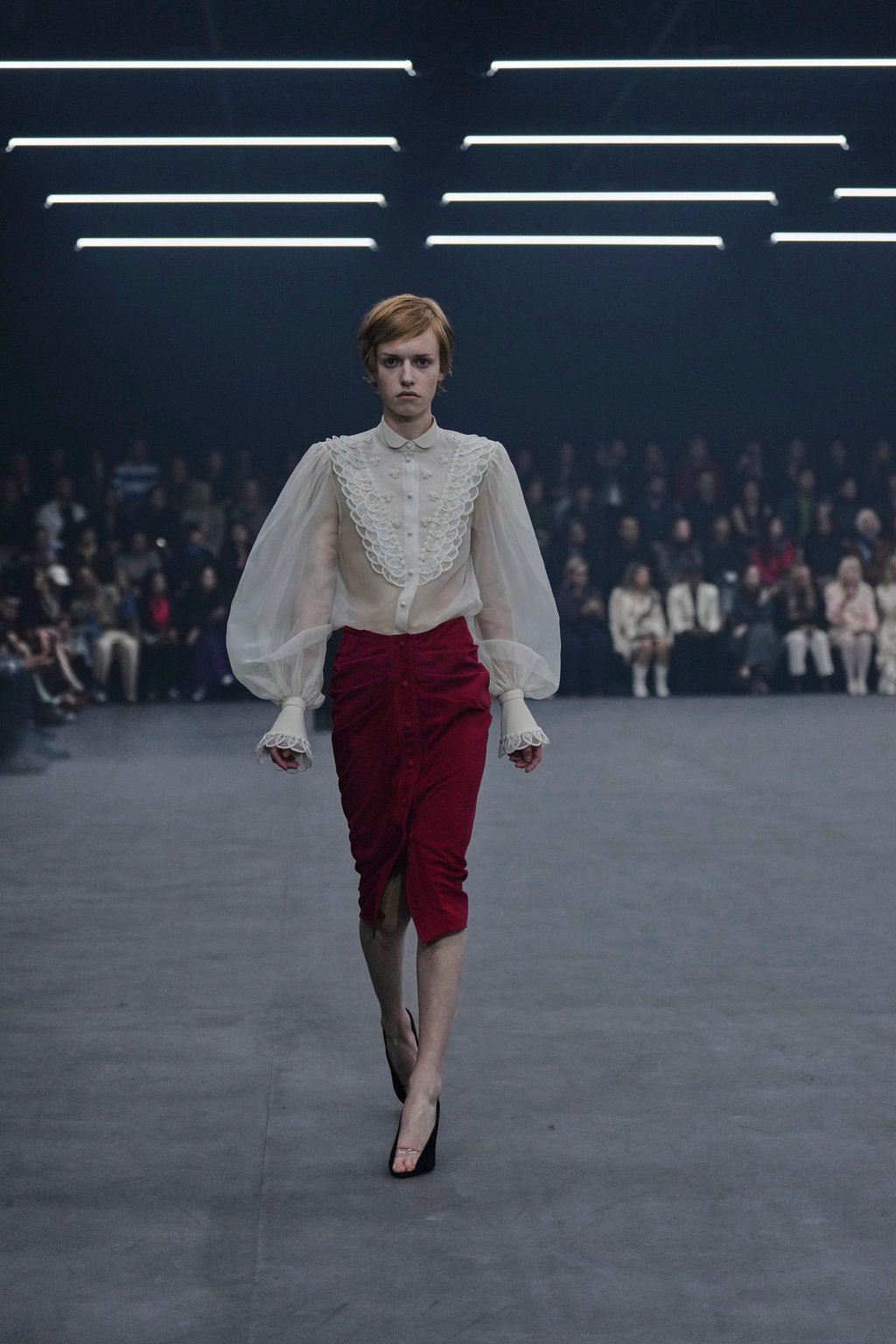 This frilly blouse paired with a red skirt was one of the best looks of the Valentino collection. Photo: AP This frilly blouse paired with a red skirt was one of the best looks of the Valentino collection. Photo: AP