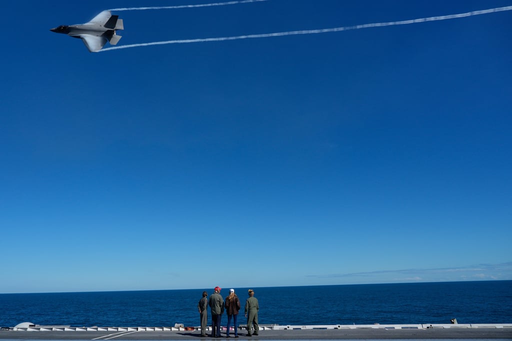 US President Donald Trump and first lady Melania Trump watch a naval sea power demonstration. Photo: AP