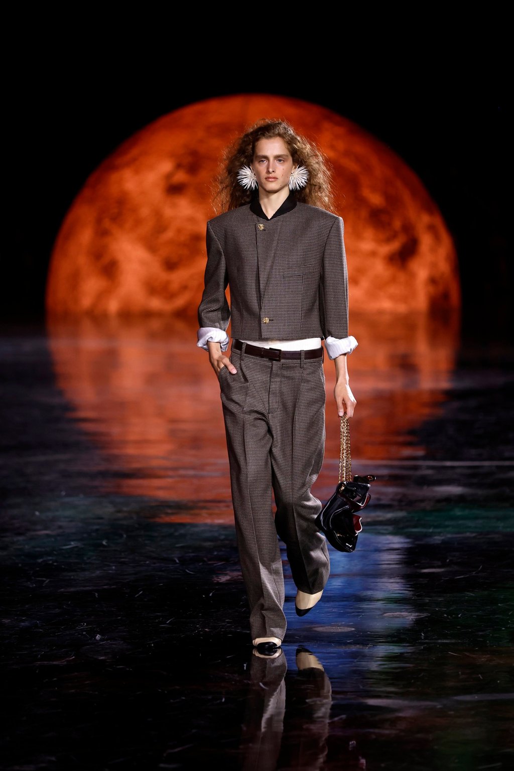 Matthieu Blazy’s Chanel show opened with this menswear-inspired look. Photo: EPA