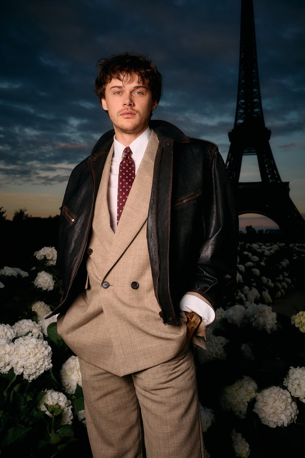 Christopher Briney put a modern spin on a classic suit for Saint Laurent’s Paris show. Photo: Getty Images Christopher Briney put a modern spin on a classic suit for Saint Laurent’s Paris show. Photo: Getty Images