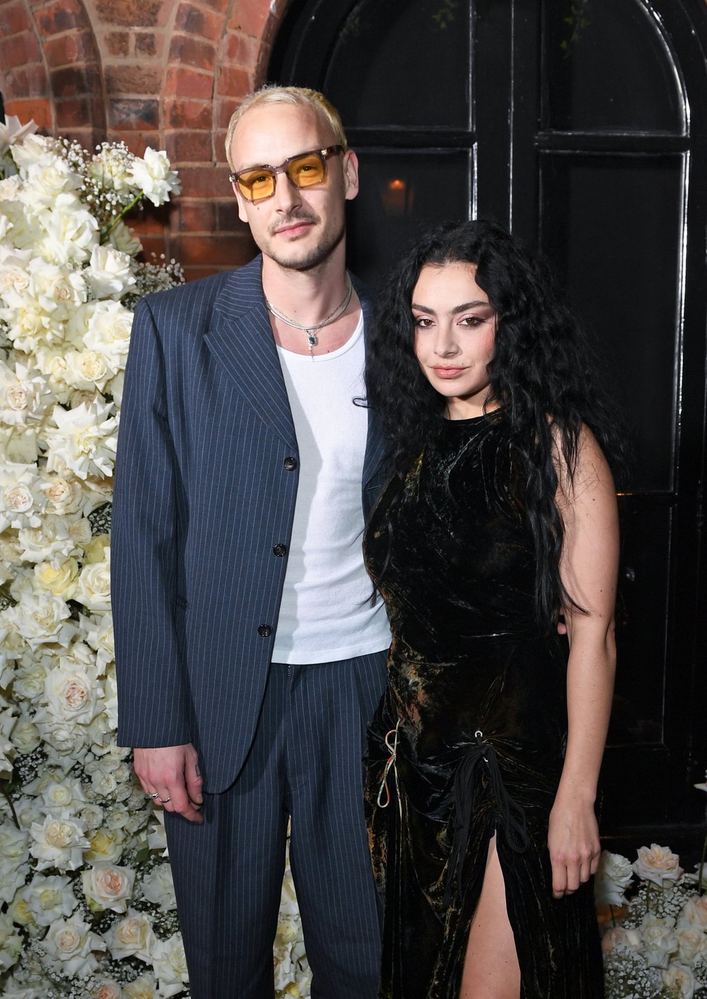 The 1975 drummer George Daniel and his wife Charli XCX in London. Charli and Taylor Swift are rumoured to have taken lyrical swipes at each other in their songs. Photo: Getty Images The 1975 drummer George Daniel and his wife Charli XCX in London. Charli and Taylor Swift are rumoured to have taken lyrical swipes at each other in their songs. Photo: Getty Images