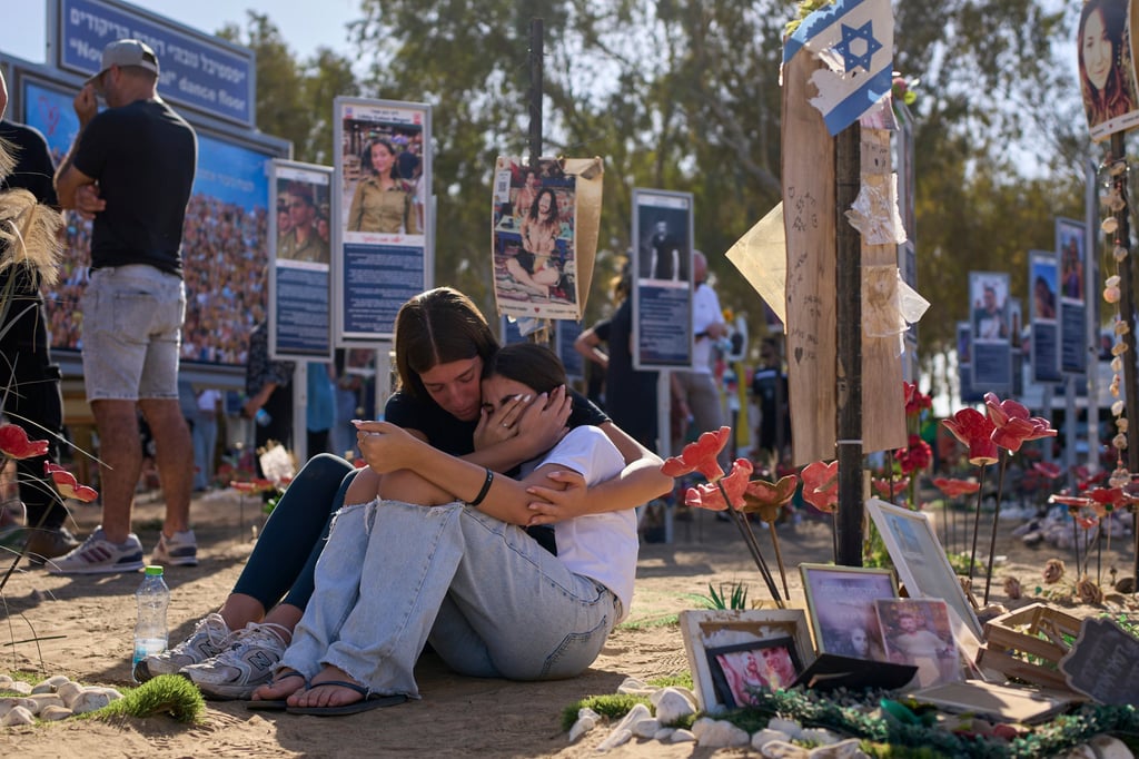People visit the site where revellers were killed and kidnapped in the October 7 attack by Hamas militants at the Nova music festival, a day after the country marked the second anniversary of the attack, near Kibbutz Reim, southern Israel. Photo: AP