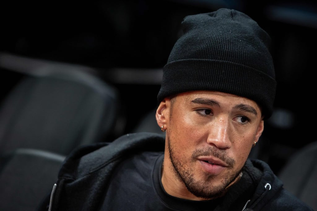 The Phoenix Suns’ Devin Booker talks to media in Macau on Thursday. Photo: AFP The Phoenix Suns’ Devin Booker talks to media in Macau on Thursday. Photo: AFP