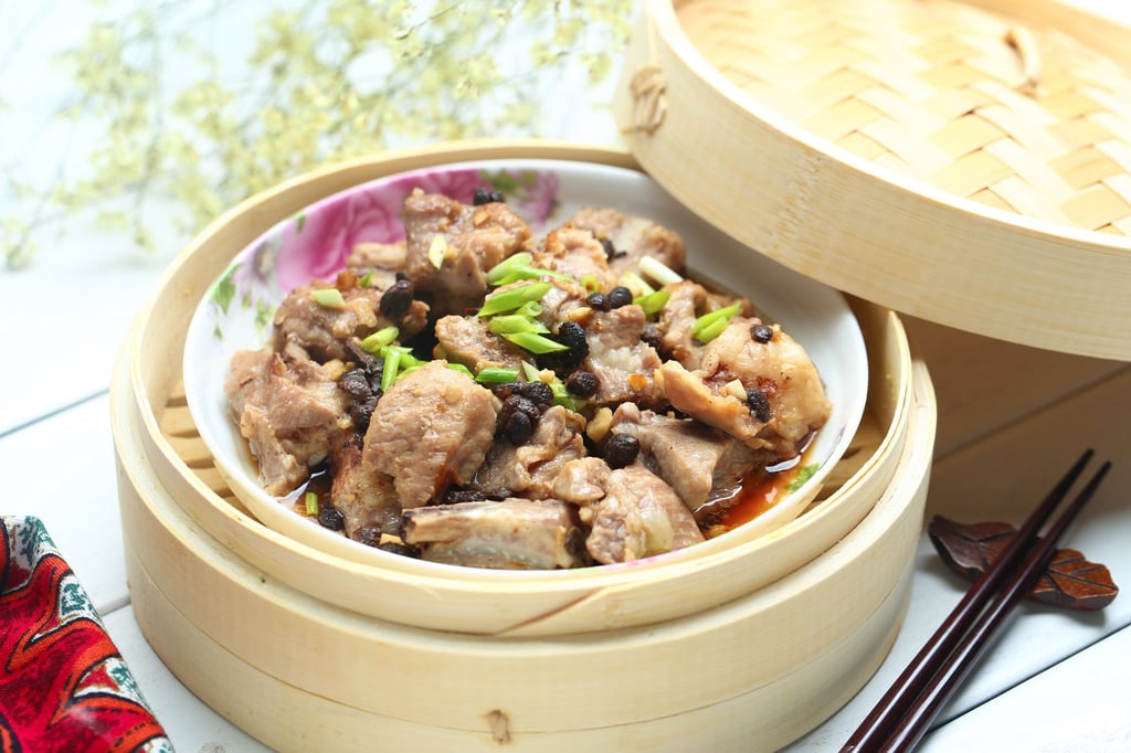Steamed spare ribs with black beans in a bamboo steamer. Photo: Shutterstock Steamed spare ribs with black beans in a bamboo steamer. Photo: Shutterstock