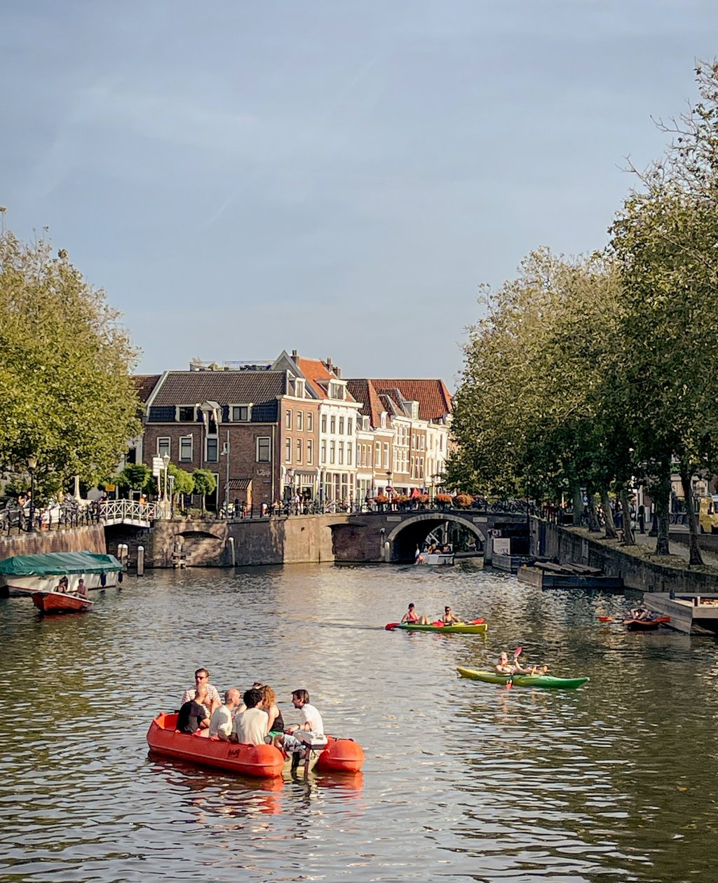 Residents soak up the sunshine on one of Utrecht’s picturesque canals. Photo: Ron Gluckman Residents soak up the sunshine on one of Utrecht’s picturesque canals. Photo: Ron Gluckman