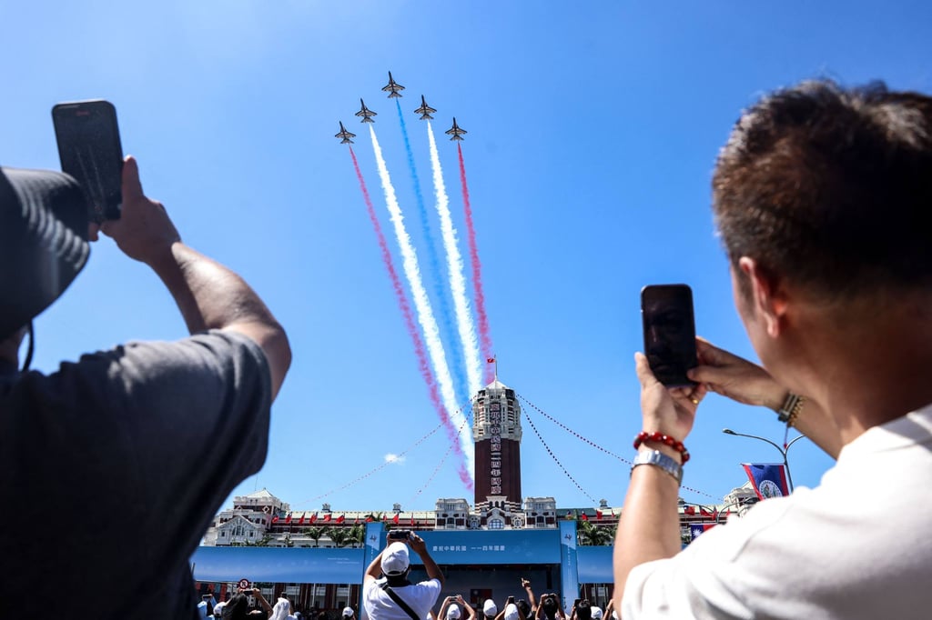 Taiwanese AT-3 advanced jet trainers perform during Double Tenth celebrations at the Presidential Palace in Taipei on Friday. Photo: AFP Taiwanese AT-3 advanced jet trainers perform during Double Tenth celebrations at the Presidential Palace in Taipei on Friday. Photo: AFP