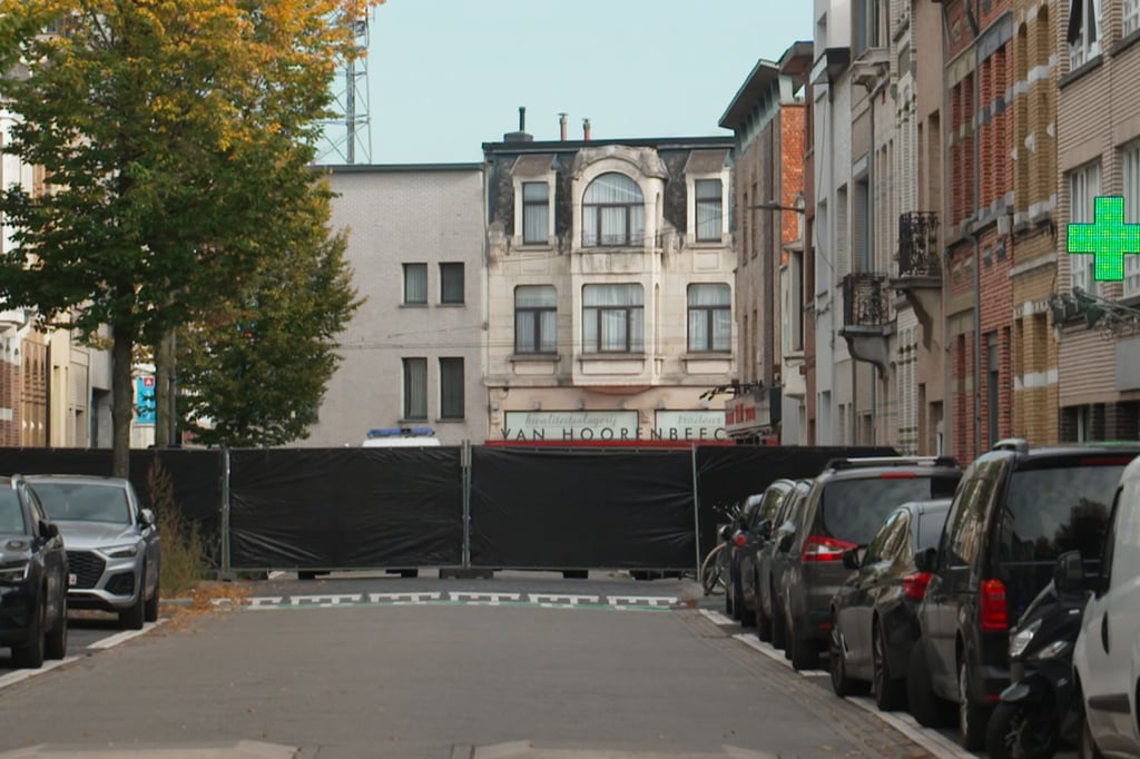 A black police cordon in an Antwerp street during an investigation. Photo: VTM via AP A black police cordon in an Antwerp street during an investigation. Photo: VTM via AP
