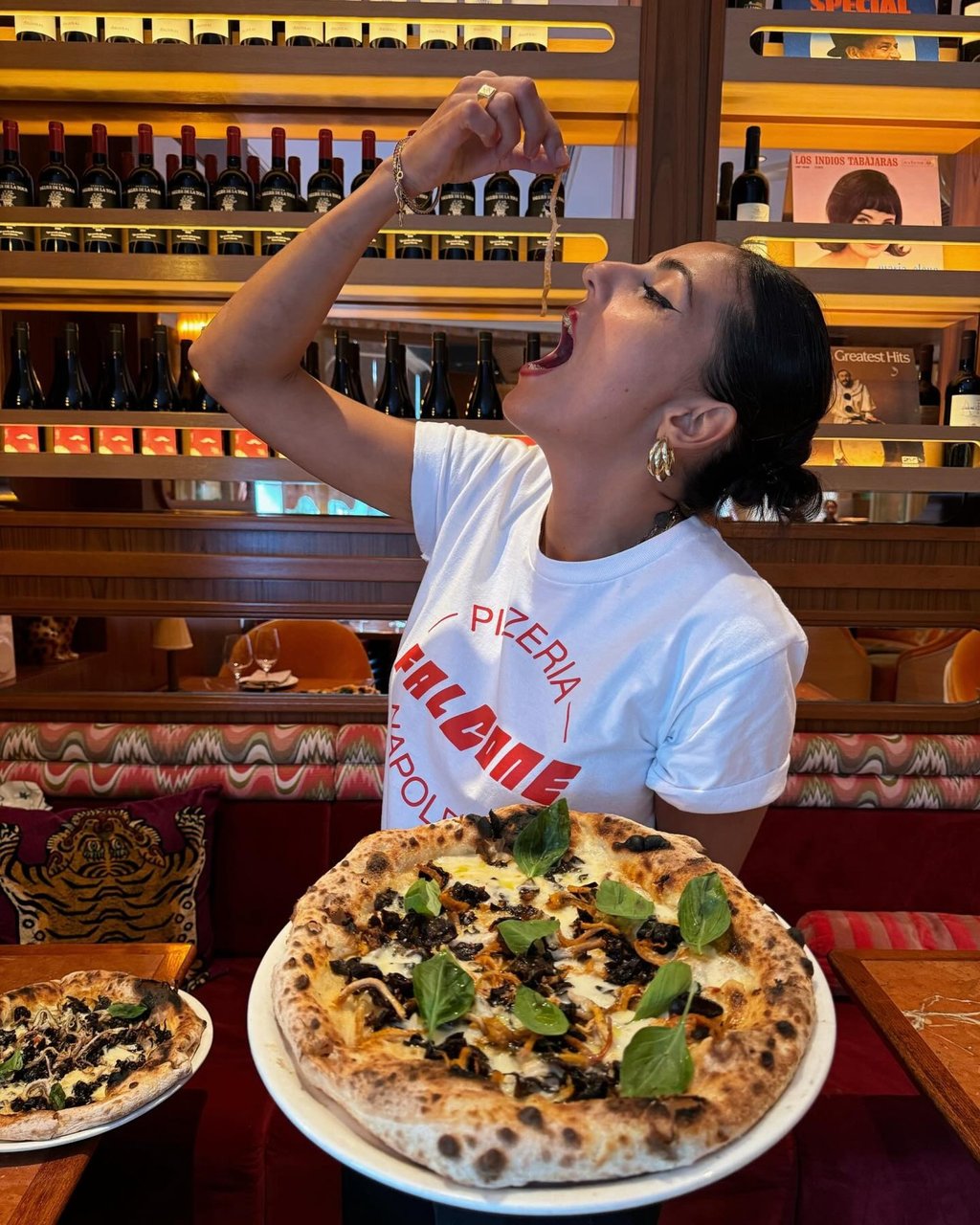 Pizzaiola Roberta de Sario of Falcone, trying the snake-meat pizza. Photo: @falconehk/Instagram Pizzaiola Roberta de Sario of Falcone, trying the snake-meat pizza. Photo: @falconehk/Instagram