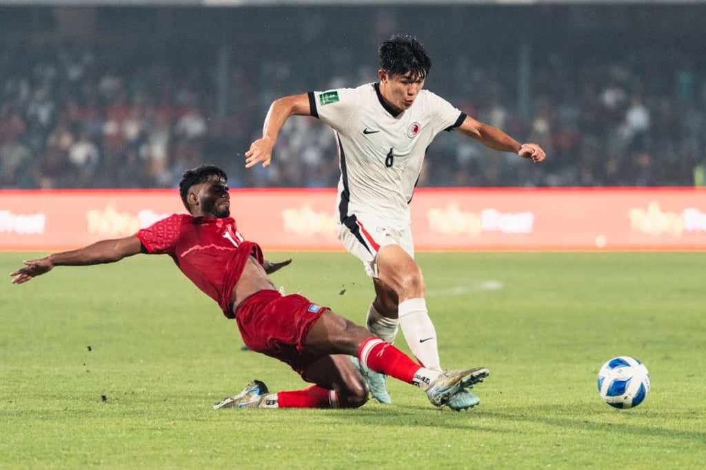 Midfielder Tan Chun-lok bursts clear of Bangladesh’s Foysal Ahmed Fahim. Photo: HKFA Midfielder Tan Chun-lok bursts clear of Bangladesh’s Foysal Ahmed Fahim. Photo: HKFA