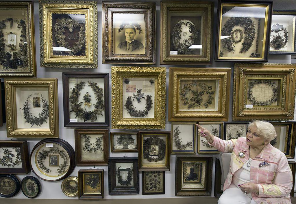 Cohoon points at artworks in her collection at the museum in 2014. Photo: TNS