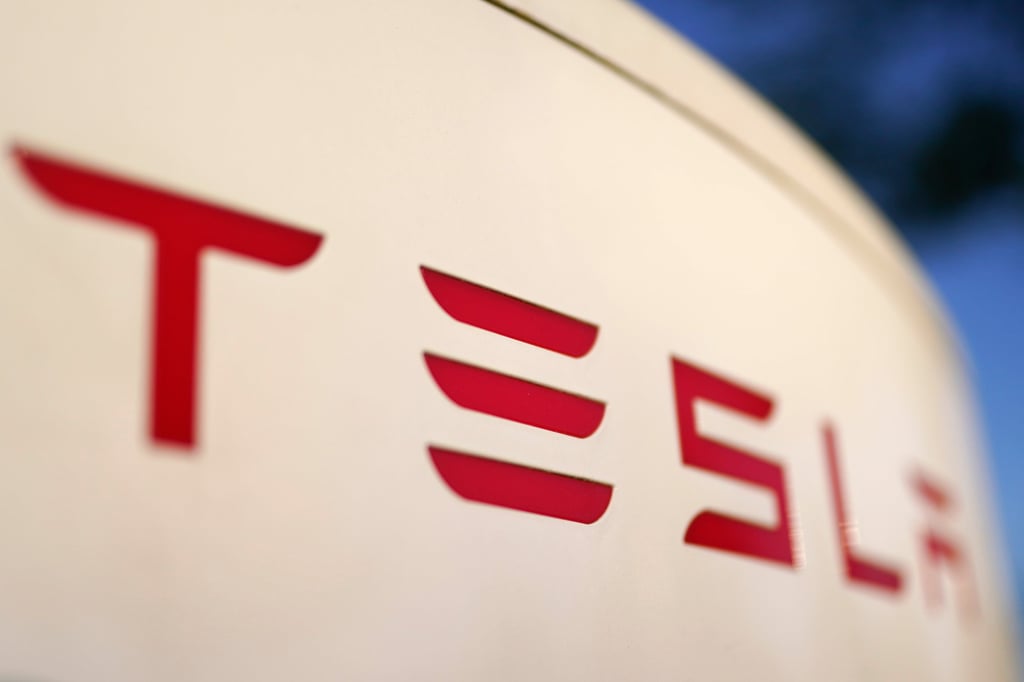 The Tesla logo seen on a supercharger station in Buford, Georgia, US, April 22, 2021. Photo: AP The Tesla logo seen on a supercharger station in Buford, Georgia, US, April 22, 2021. Photo: AP