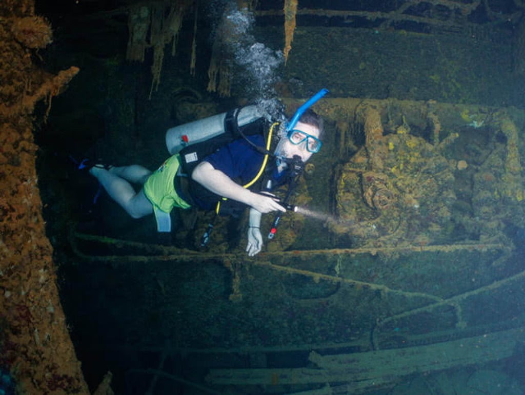The writer scuba diving near the wreck of the Kiyosumi Maru, another Japanese Imperial Navy vessel, in Chuuk Lagoon in February. Photo: Julian Ryall