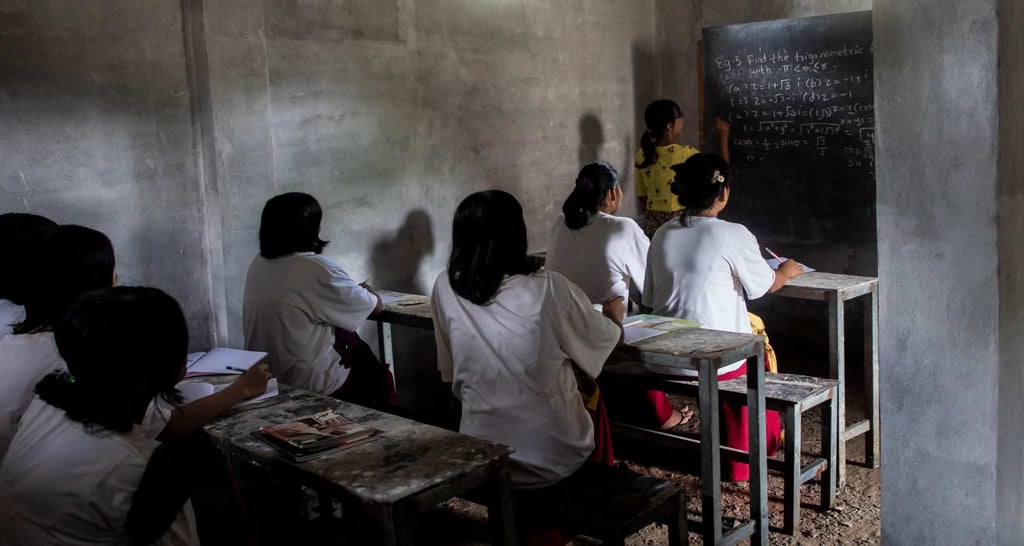 Students take notes in a classroom in a concrete bunker in Sagaing. Photo: AFP Students take notes in a classroom in a concrete bunker in Sagaing. Photo: AFP