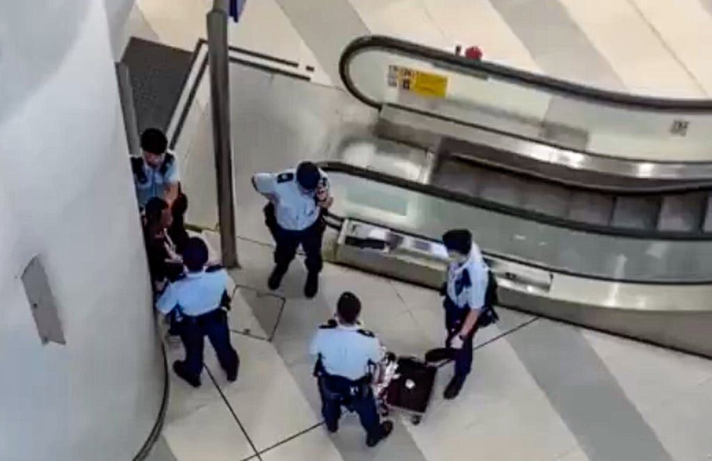 Footage of the case shows five officers stopping the man in Yuen Long station. Photo: Handout