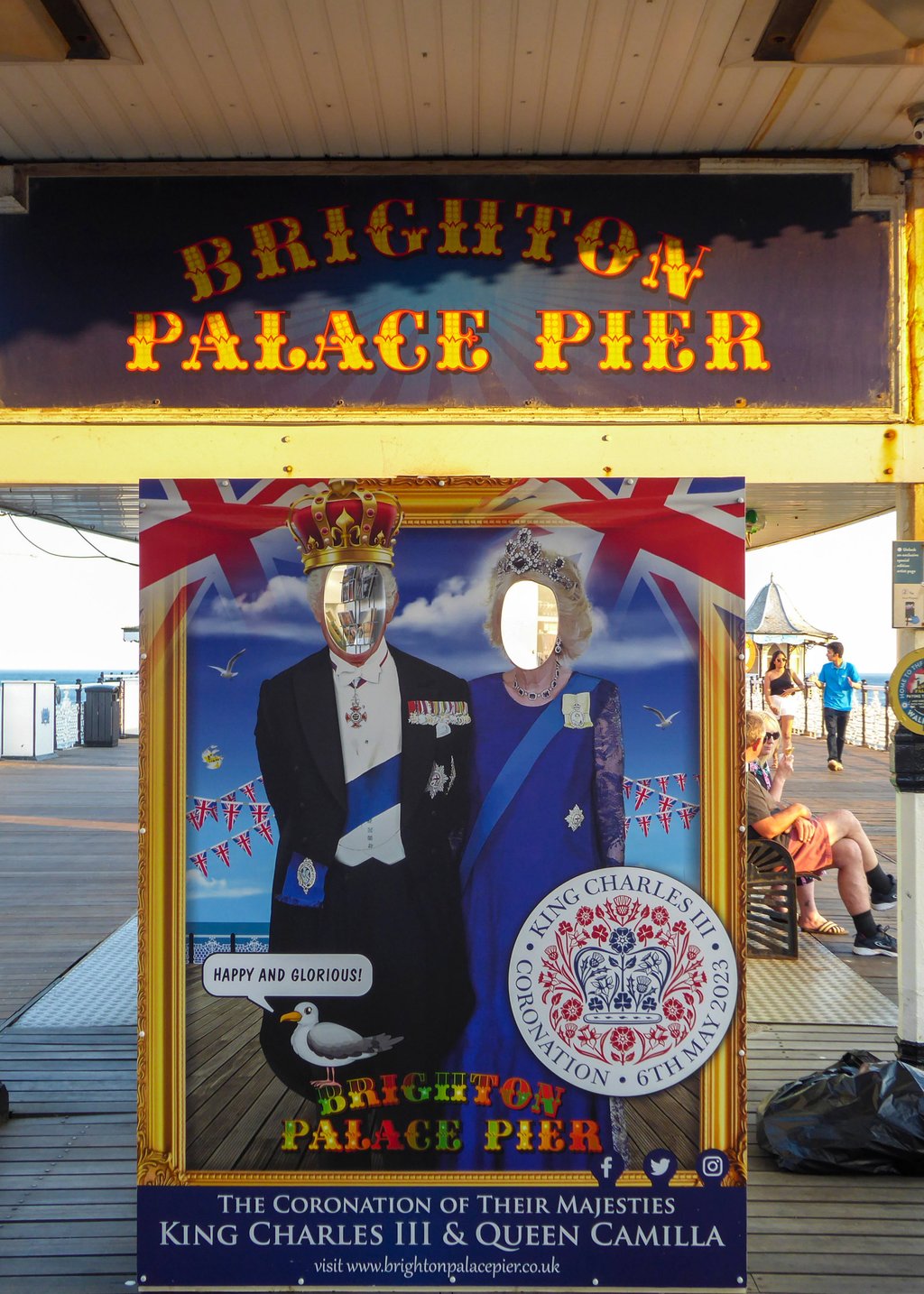 Play at being King Charles and Queen Camilla by taking a photo behind a board at Brighton Palace Pier. Photo: Alexandra Stahl/dpa